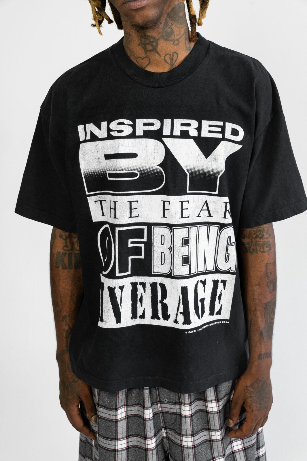 INSPIRED BY THE FEAR OF BEING AVERAGE TEE