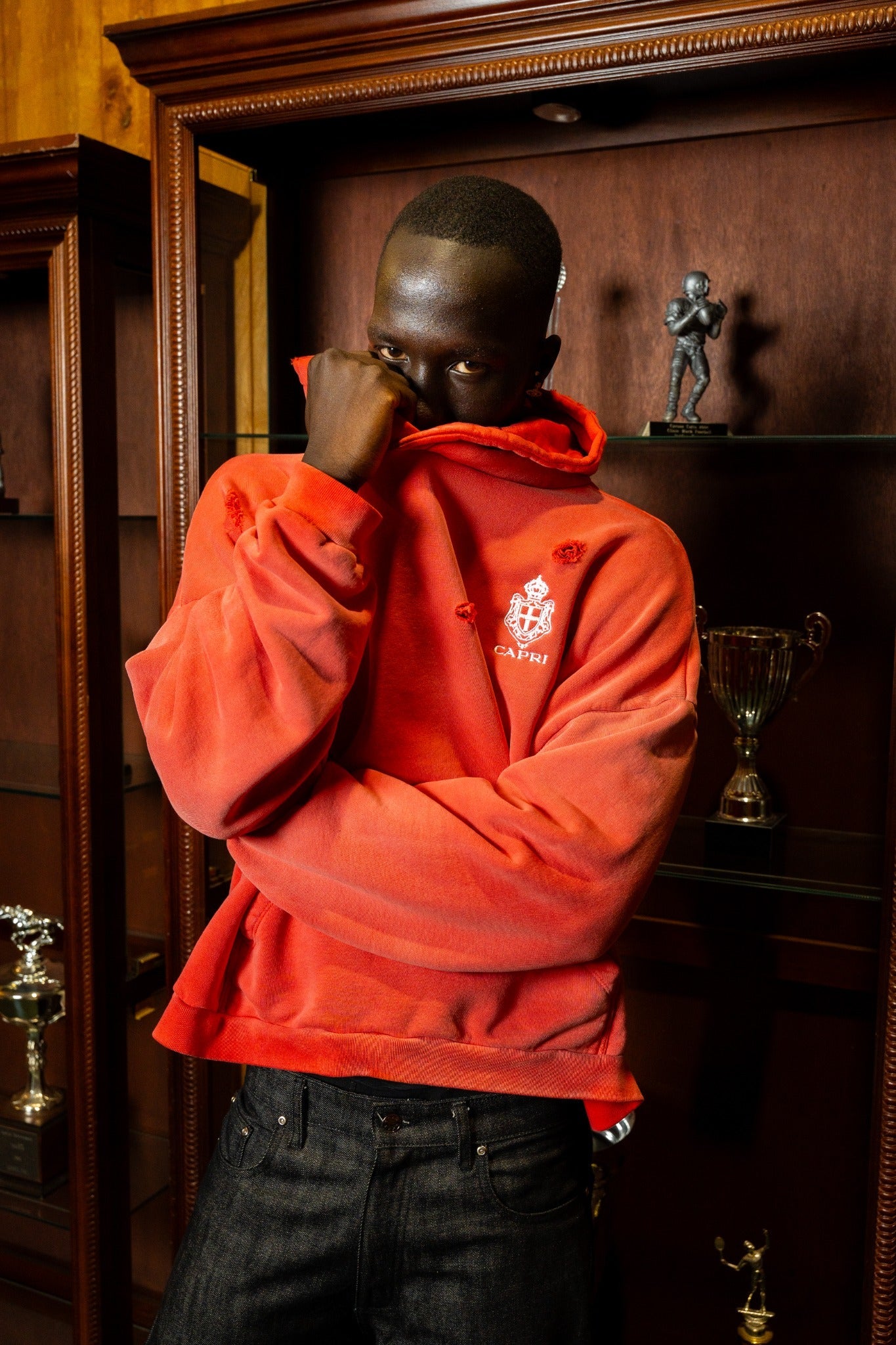 Capri Crest Hoodie crimson red on-body
